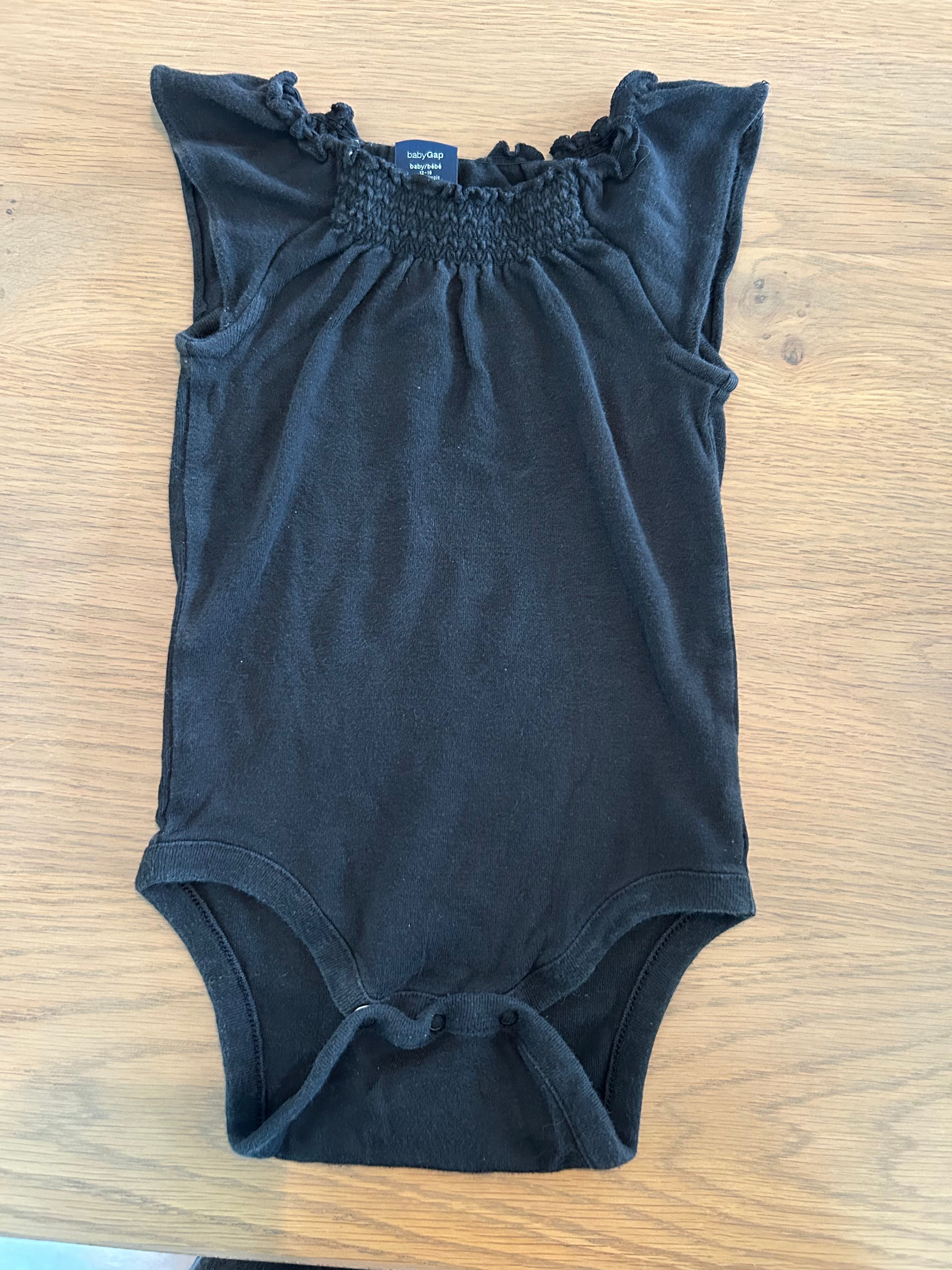 Baby Gap Black Bodysuit With Ruffle Around Necck- 12-18 Months